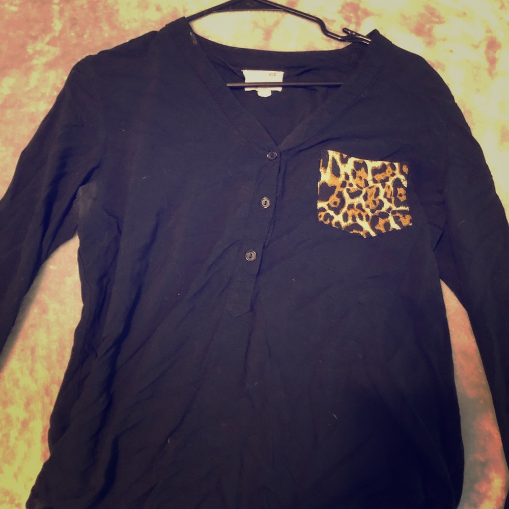 Black long sleeve top with cheetah print pocket